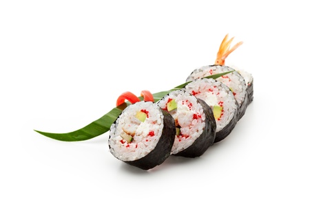 Japanese Cuisine - Sushi Roll with Shrimps, Eel, Avocado, Tobiko and Cream Cheese insisde. Served with Lime Sliceの写真素材