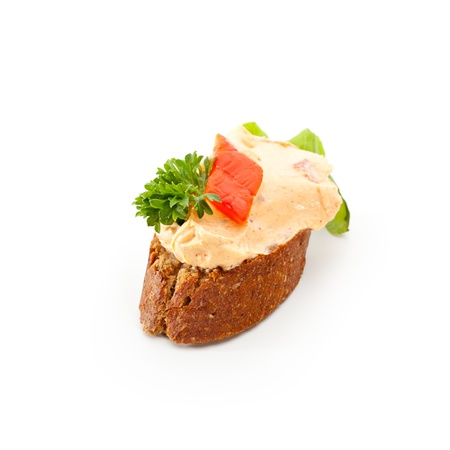 Cheese Canapes - Paprika Cream Cheese on Dark Breadの写真素材