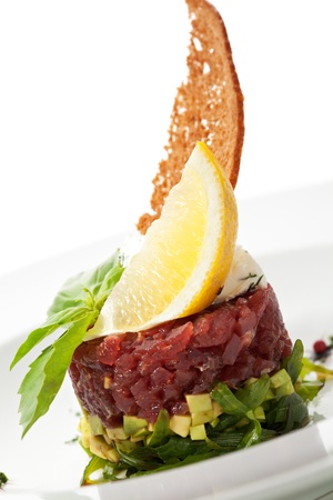 Tuna with Avocado Tartare with Lemon Sliceの写真素材