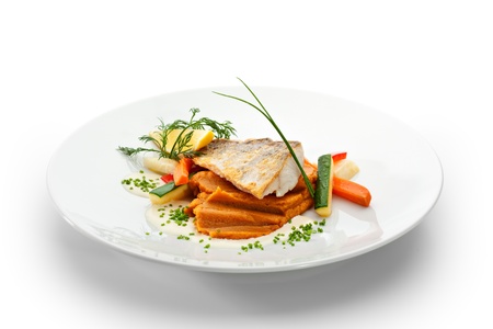 Fried Fish (Zander). Garnished with Lemon,  Sweet Mash and Vegetablesの写真素材