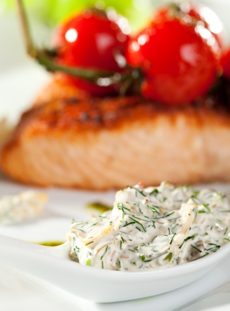 Salmon Steak with Fresh Celery and Cherry Tomatoの写真素材