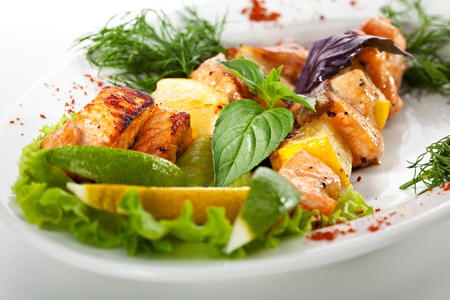 Skewered Salmon with Lemon, Herbs and Vegetablesの写真素材
