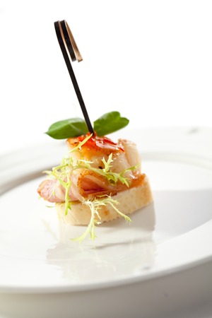 Scallop with Bacon Isolated ove Whiteの写真素材