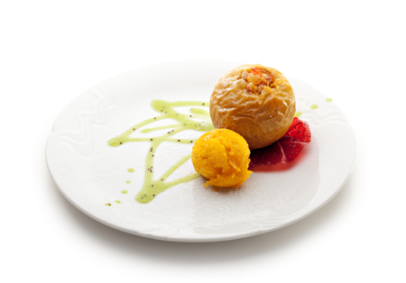 Baked Apple with Mango Ice Creamの写真素材