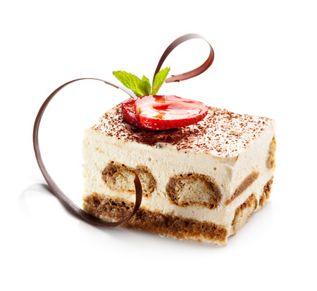 Tiramisu - Classical Dessert with Cinnamon and Coffee. Garnished with Strawberry and Mintの写真素材