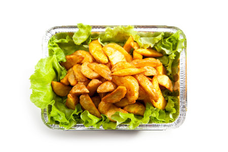 Fried Potato on Fresh Salad Leaf