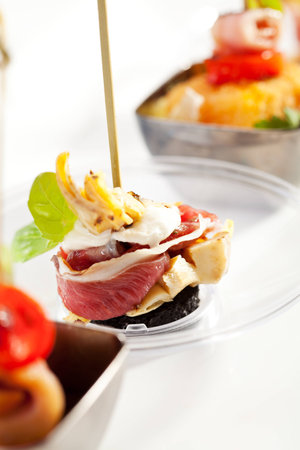 Delicious Buffet Food on White Dishの写真素材