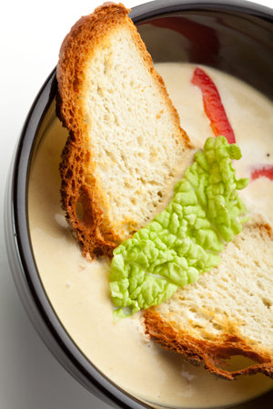 Vegetables Cream Soup. Garnished with Bread and Herbsの写真素材