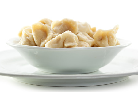 Dumplings Bowl over White Backgroundの写真素材