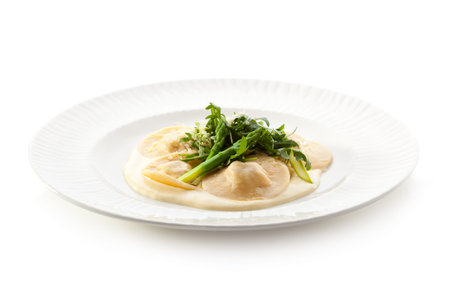 Italian Cuisine - Ravioli with Rocket Salad and Asparagusの写真素材