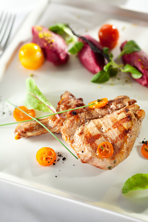 Pork Loin BBQ with Beet Cream and Sauceの写真素材