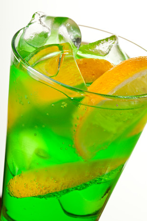 Green Cocktail with Midori, Vodka, Lemon and Iceの写真素材