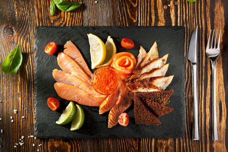 Cured FIsh with Lime, Bread and Salmon Roeの写真素材