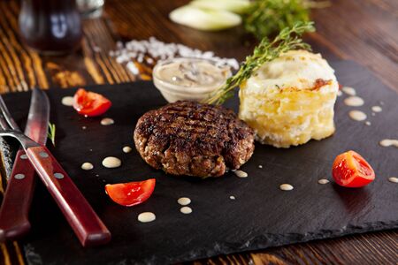 Beef Steak with Mashed Potato and Mushrooms Sauceの写真素材