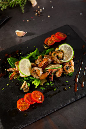 Hot Shrimp Appetizers with Herbs and Tomatoの写真素材