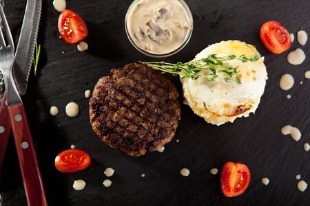 Beef Steak with Mashed Potato and Mushrooms Sauceの写真素材