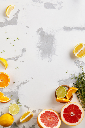 Fresh Citrus Fruits - Cube Slice of Orange, Grapeftuit and Lime. Creative Summer Fruits Layout. Top Viewの写真素材