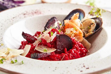 Macro shot of red beetroot risottoの写真素材
