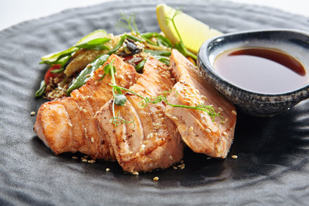 Teppanyaki Style Salmon - Grilled Salmon Fillet with Soy Sauce and Vegetables. Japanese Teppanyaki...