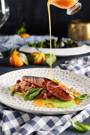 Fish Plate Restaurant Food - Grilled Salmon Steak with Vegetables Tartare. Salmon Fillet Garnished...