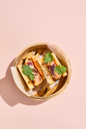 Asian Sando Sandwich with Tuna in a Steamer, Pastel Tones with Surreal Spring or Summer Flowers.の写真素材