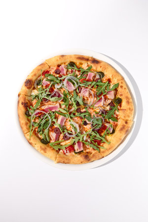 Deluxe NiÃ§oise-Style Tuna Pizza with Olives and Arugula Overhead Shot.の写真素材