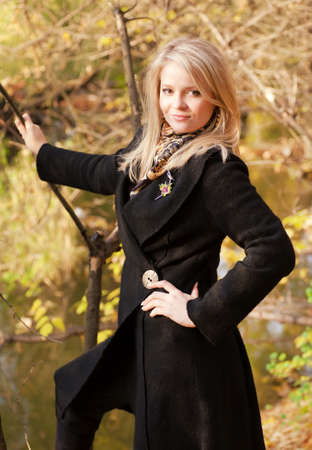 Autumn portrait of blonde girlの写真素材