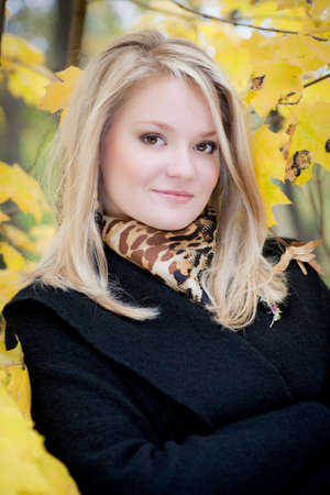 Autumn portrait of blonde girlの写真素材