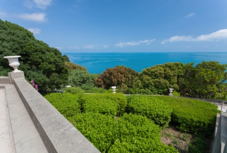 beautiful landscape - white roses, sea and sky in Vorontsov Palace, Crimea, Ukraineのeditorial素材