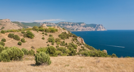 Beach between rocks and sea. Shot in the Cape Aia Nature Reserve, near Balaklava/Sevastopo l, Crimea peninsula, Black Sea, Ukraine.の写真素材