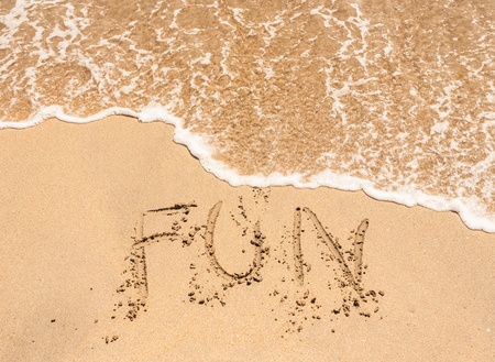 Fun handwritten in sand for natural, symbol,tourism or conceptual designsの写真素材