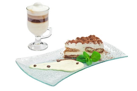 Cake tiramisu and a cup of hot coffeeの写真素材