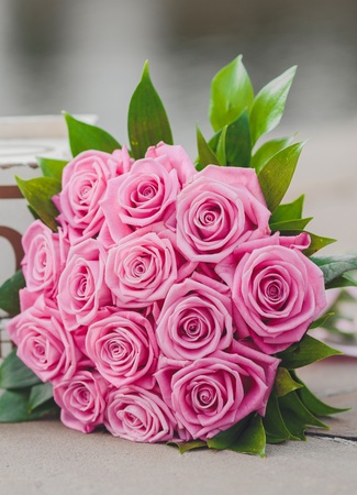 Beautiful wedding bouquet in hands of the brideの写真素材
