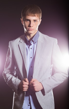 Young Happy Man Over a Black の写真素材