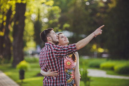 a young couple in love walking in the woodsの写真素材