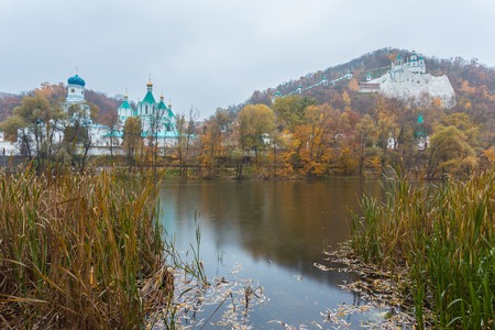 Orthodox church in Svyatogorsk, Donetsk Region, Ukraine, autumn landscapeの写真素材