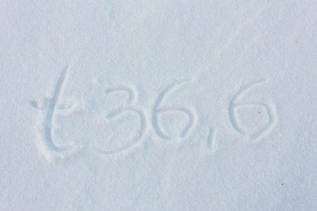 The word 36,6 draw on snow backgroundの写真素材