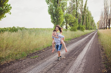young couple in love walking in natureの写真素材