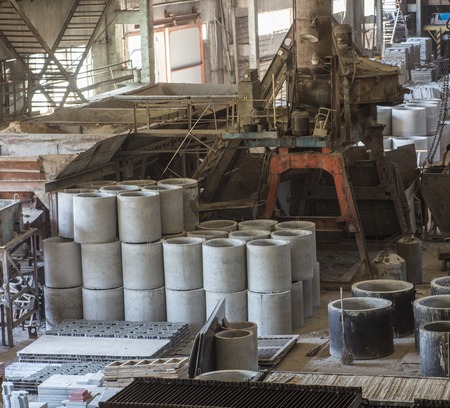 Stack of precast reinforced concrete slabs in a house-building factoryの写真素材