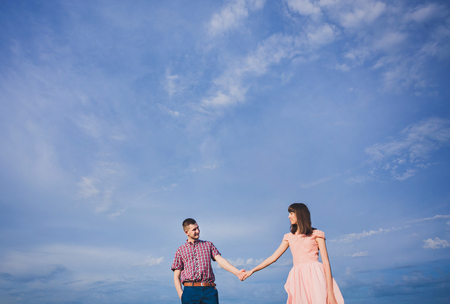 a young couple in love walking in the woodsの写真素材