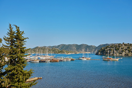 ancient city in Kekova and a boat with turkish flag, Antalya, Turkey. Image of summer vacation in Turkey.の写真素材