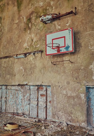 Abandoned school in Pripyat, Chernobyl zone. Abandoned gym. Abandoned basketball hall.の写真素材
