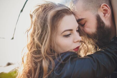 Cute couple in the park on a sunny dayの写真素材