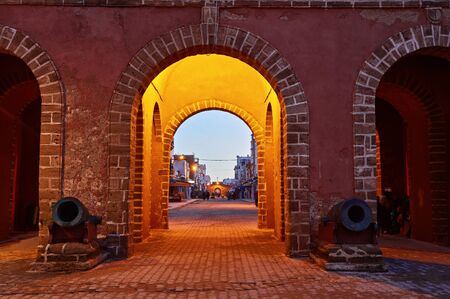Medina entrance tower and old city walls in Essaouira, Moroccoの写真素材