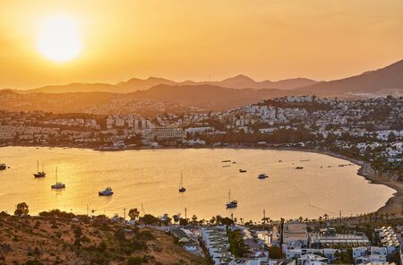 Panoramic Sunset view of Gumbet bay in Bodrum on Turkish Riviera. Bodrum is a district and a port city in Mugla Province, in the southwestern Aegean Region of Turkeyの写真素材