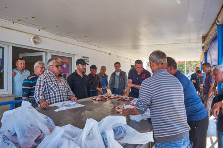 CESME -TURKEY - APRIL 25, 2018: Fish market, people buy fresh fish from fishermen at a small auction in Cesme, Izmir, Turkeyのeditorial素材