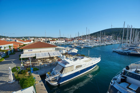 CESME -TURKEY - APRIL 25, 2018: Marina yachts and buildings on background in Cesme, Turkeyのeditorial素材
