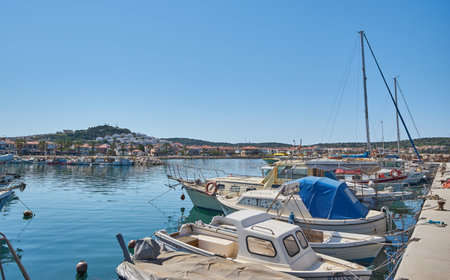 CESME -TURKEY - APRIL 25, 2018: Marina yachts and buildings on background in Cesme, Turkeyのeditorial素材
