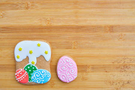 Easter homemade gingerbread cookie over wooden table