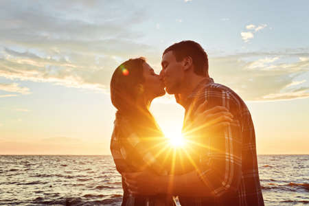 Happy couple at a lake in the countrysideの写真素材